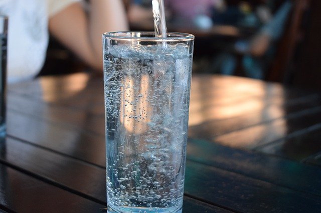 A close up of a glass cup on a table